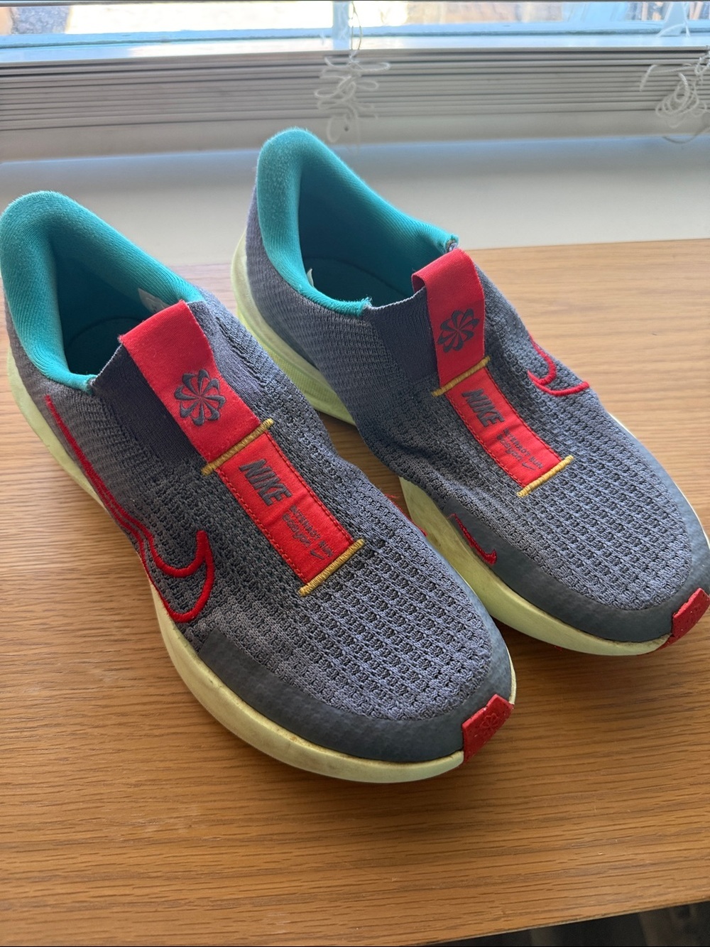 Nike Kids Gray Slip-On Sneakers with Red & Teal Accents